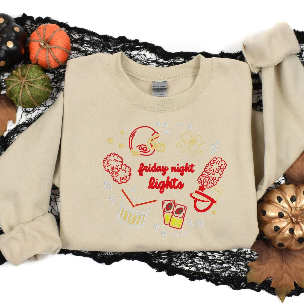 Sand Friday Night Lights embroidered sweatshirt styled with fall pumpkins