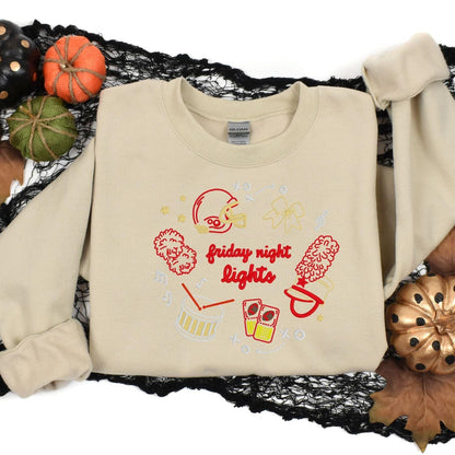 Sand Friday Night Lights embroidered sweatshirt styled with fall pumpkins
