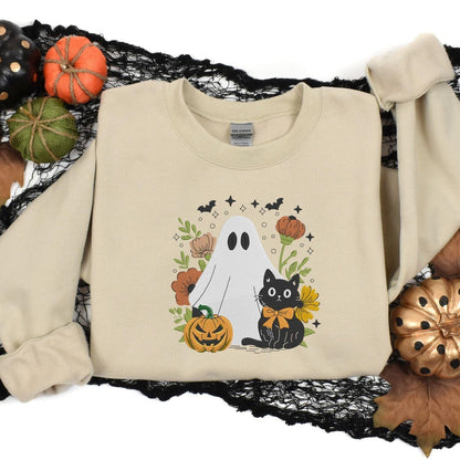 Sand ghost and cat embroidered sweatshirt styled with pumpkins and Halloween decor
