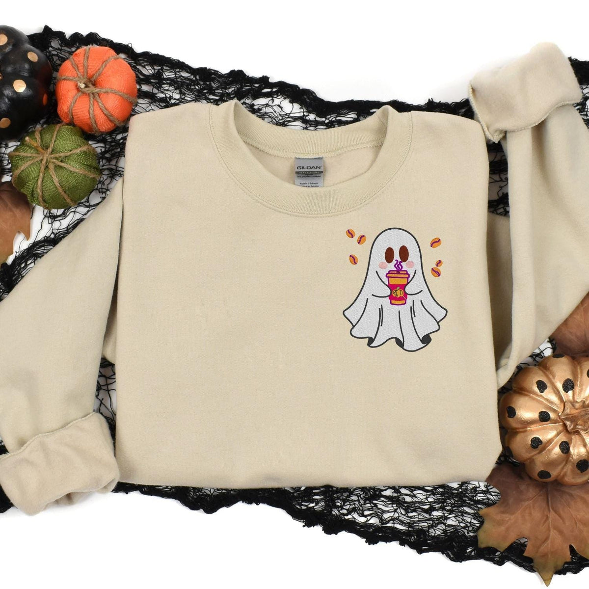 Sand ghost coffee embroidered sweatshirt styled with pumpkins and Halloween decor