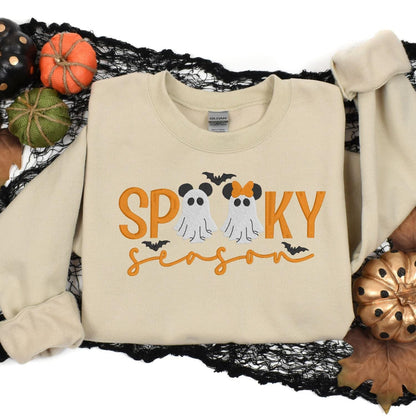 Sand ghost embroidered sweatshirt styled in a Halloween pumpkin flat lay