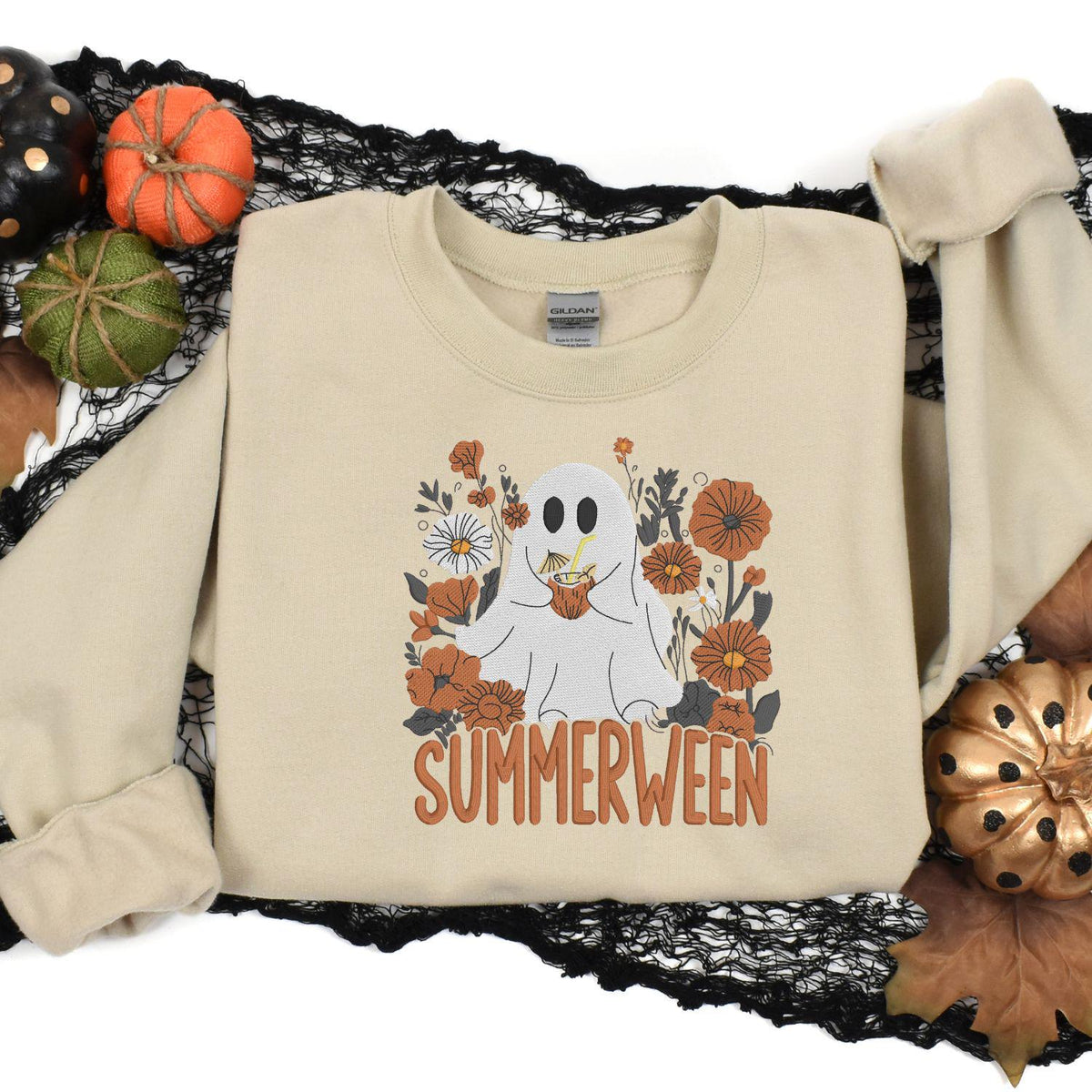 Sand Summerween ghost embroidered sweatshirt in a Halloween pumpkin flat lay