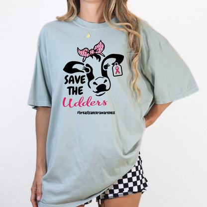 Blue breast cancer awareness cow graphic tee worn with checkered shorts