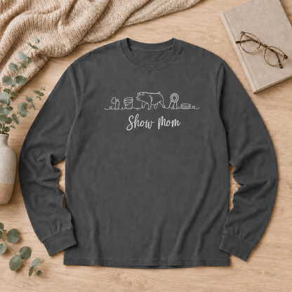 Pepper Comfort Colors 6014 Show Pig Mom shirt with white embroidery flat lay