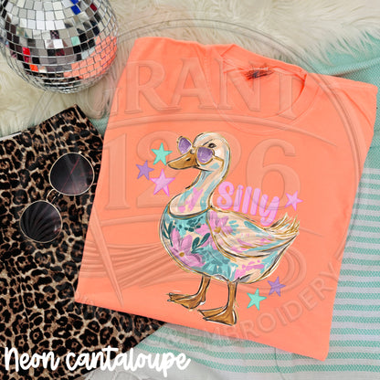 Neon cantaloupe funny goose Comfort Colors shirt flat lay