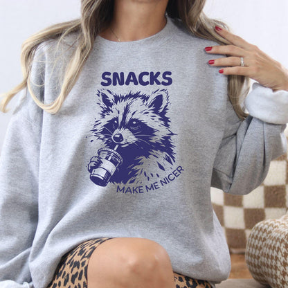 Model wearing sport gray Snacks Make Me Nicer raccoon sweatshirt