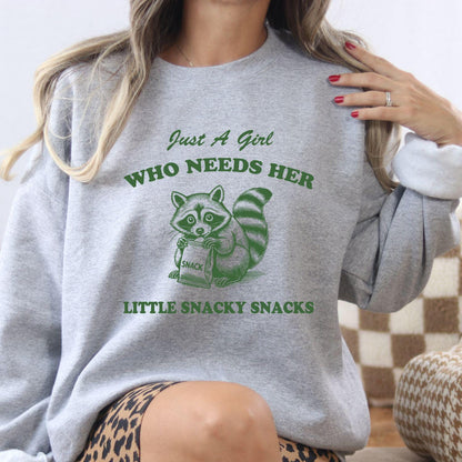 Sport gray raccoon snack lover graphic sweatshirt modeled indoors
