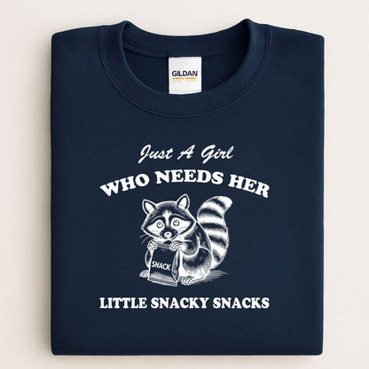 Navy Just a Girl Who Needs Her Little Snacky Snacks raccoon sweatshirt folded flat