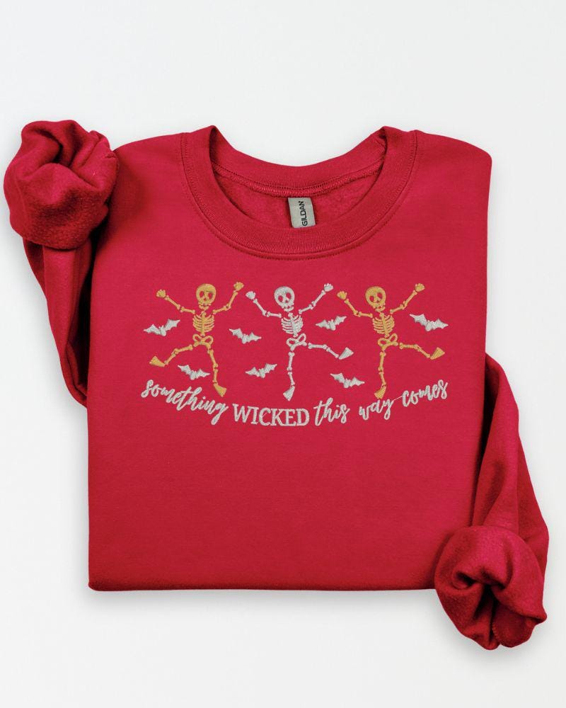 Something Wicked Halloween skeleton crewneck with embroidered bats and skeleton artwork