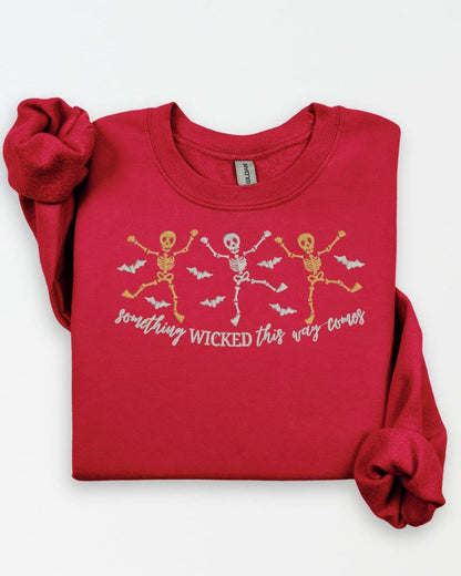 Something Wicked Halloween skeleton crewneck with embroidered bats and skeleton artwork