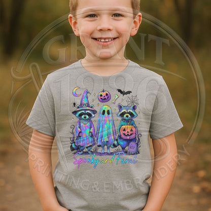 Child wearing gray Spooky and Feral Halloween raccoon graphic T-shirt