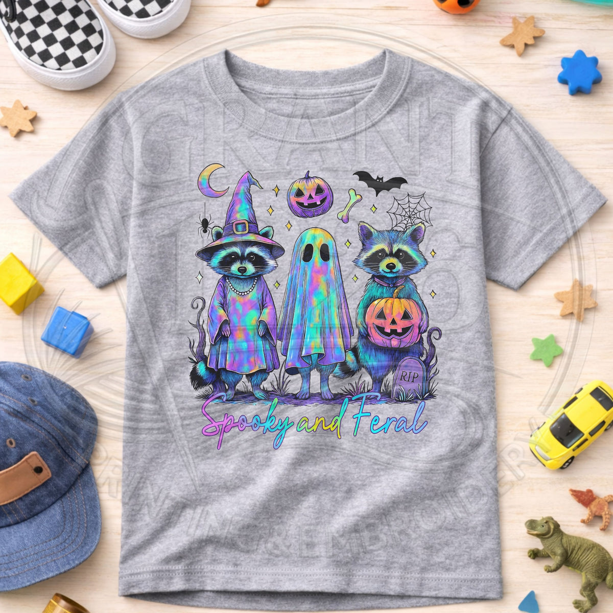 Heather gray kids T-shirt with Spooky and Feral raccoon, ghost, and pumpkin graphic