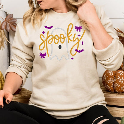 Sand embroidered Halloween sweatshirt with ghost, orange Spooky script, purple bows and bats