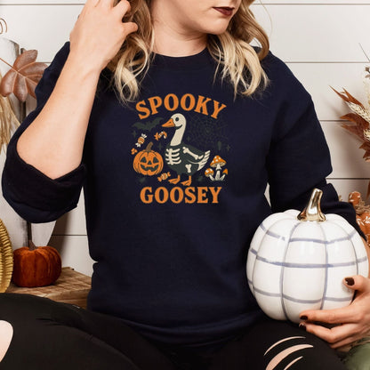 Navy Spooky Goosey embroidered Halloween sweatshirt with skeleton goose, pumpkin, candy, bats and mushrooms