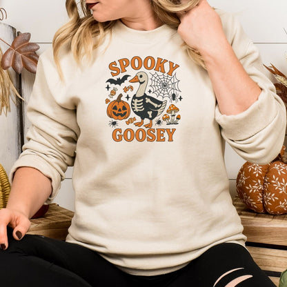 Sand Spooky Goosey embroidered sweatshirt shown as a casual Halloween outfit