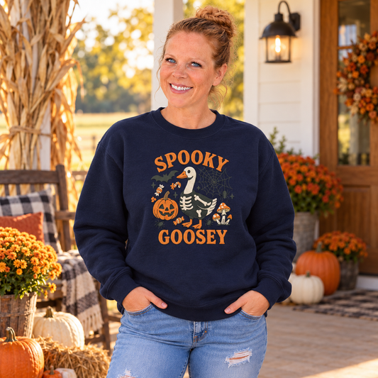 Woman wearing Navy Spooky Goosey embroidered Halloween sweatshirt