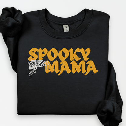 Black Spooky Mama Halloween sweatshirt with gold embroidered gothic lettering and white spiderweb