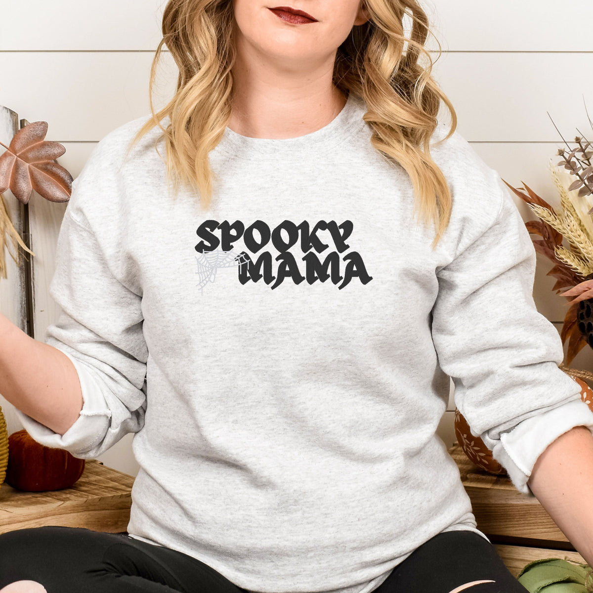 Ash gray embroidered Halloween mom sweatshirt featuring gothic Spooky Mama text and stitched spiderweb