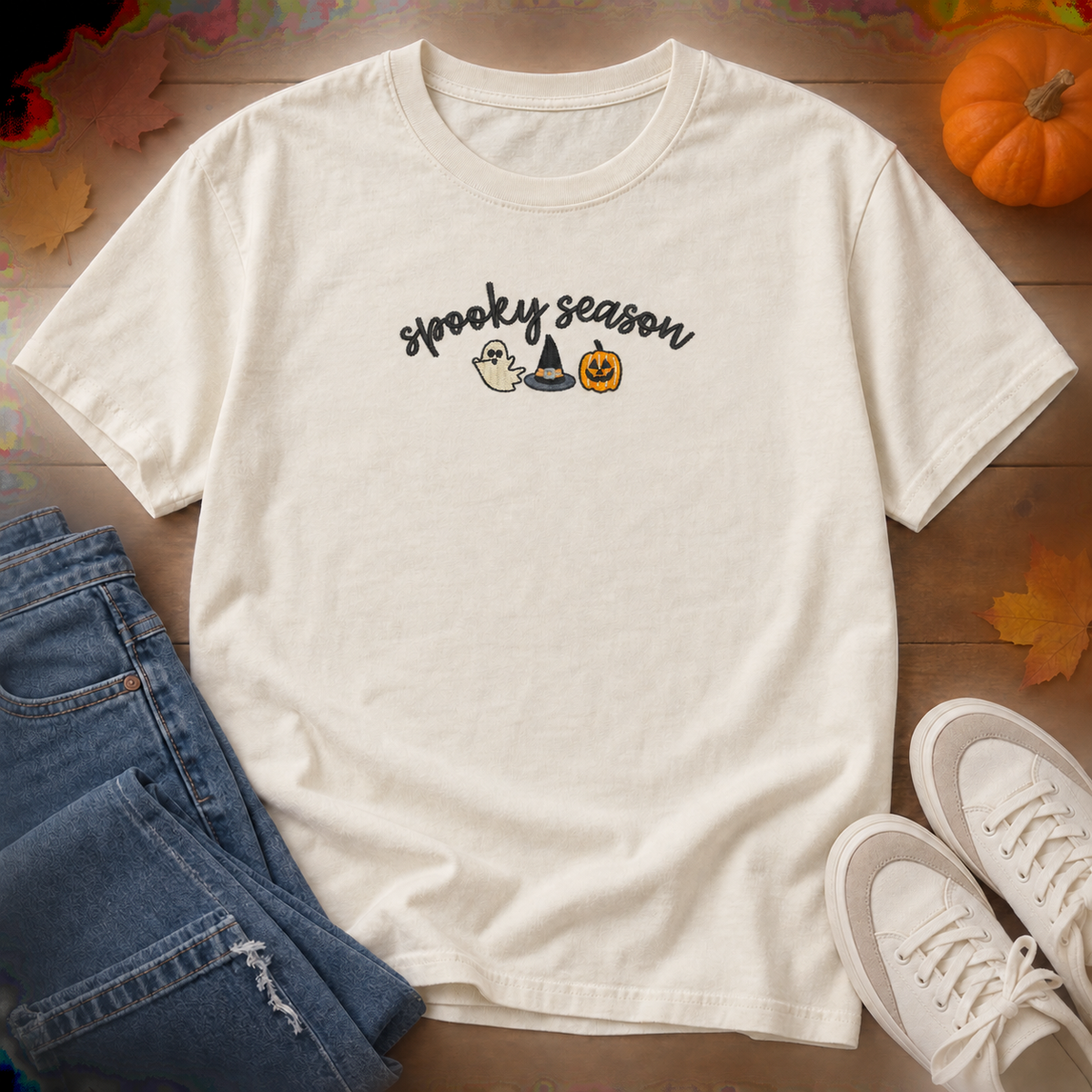 Ivory adult short sleeve tee with compact 8 by 3 inch Spooky Season embroidery