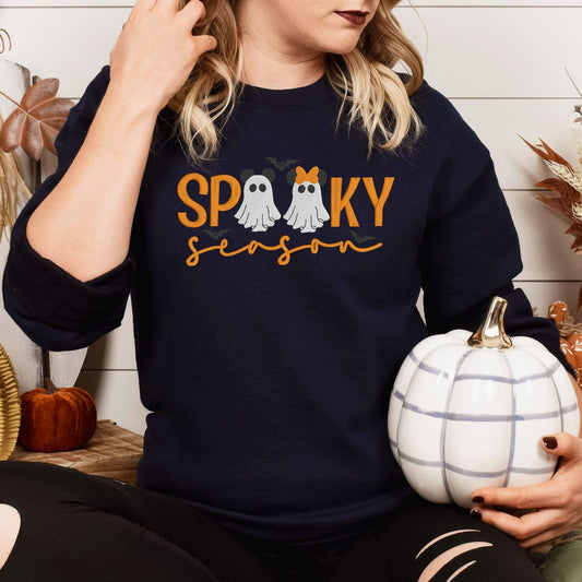 Navy Spooky Season ghosts and bows embroidered sweatshirt with pumpkin, lifestyle view