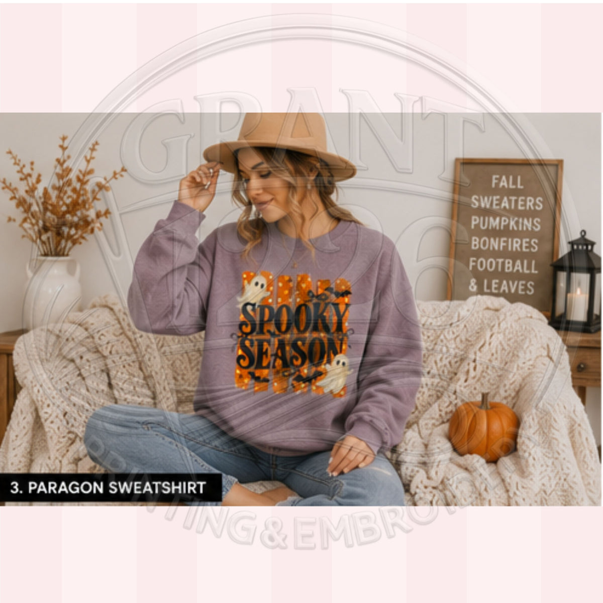 Woman wearing Paragon Spooky Season ghost crewneck sweatshirt in cozy fall setting
