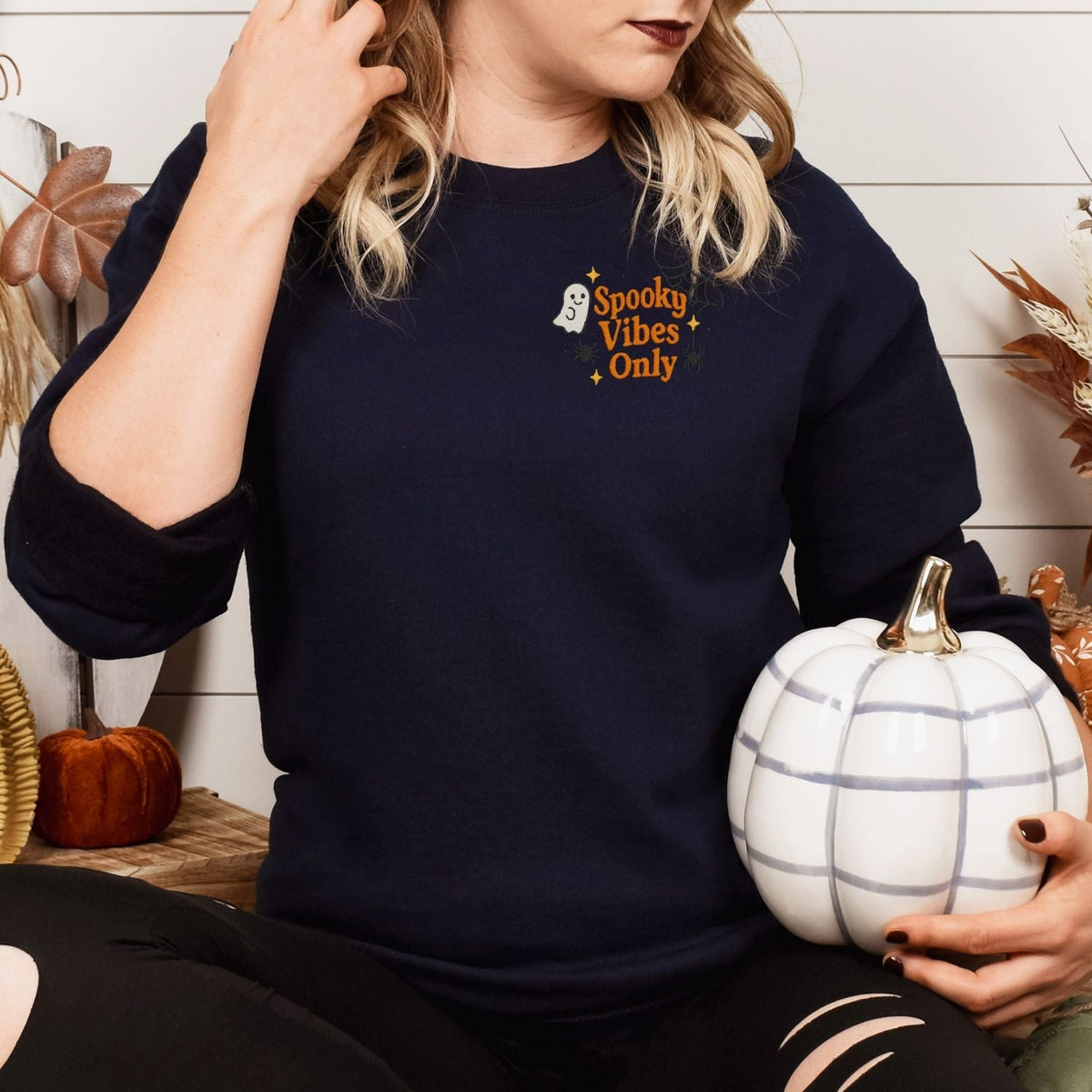Navy Spooky Vibes Only embroidered sweatshirt styled with a white pumpkin