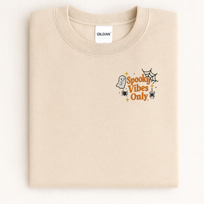 Sand Spooky Vibes Only embroidered sweatshirt with ghost and spiderweb, lifestyle view