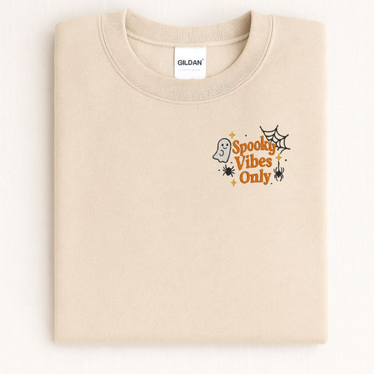 Sand Spooky Vibes Only embroidered sweatshirt with ghost and spiderweb, lifestyle view