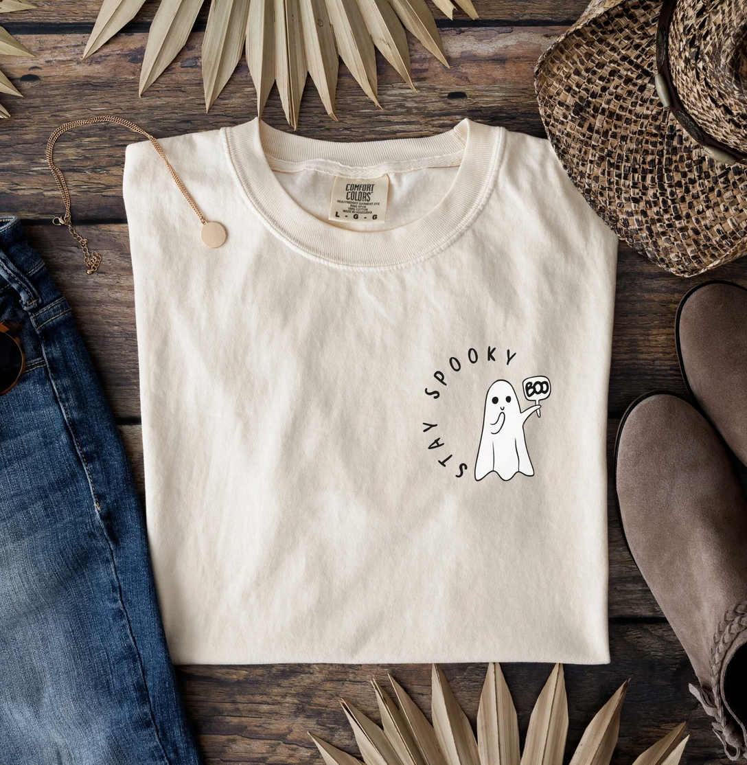 Stay Spooky ghost embroidered Comfort Colors 1717 Ivory T-shirt flat lay