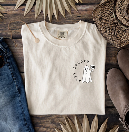 Stay Spooky ghost embroidered Comfort Colors 1717 Ivory T-shirt flat lay
