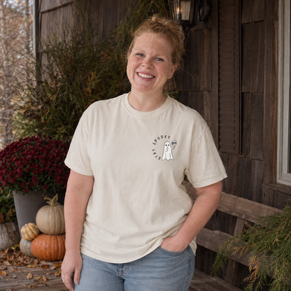 Stay Spooky ghost embroidered Comfort Colors 1717 Ivory T-shirt modeled by Samantha on a rustic fall porch