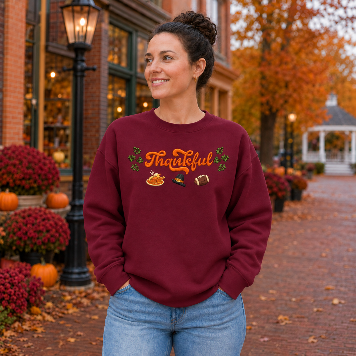 Maroon Gildan Softstyle sweatshirt with fall Thankful embroidery, pie, pilgrim hat, and football