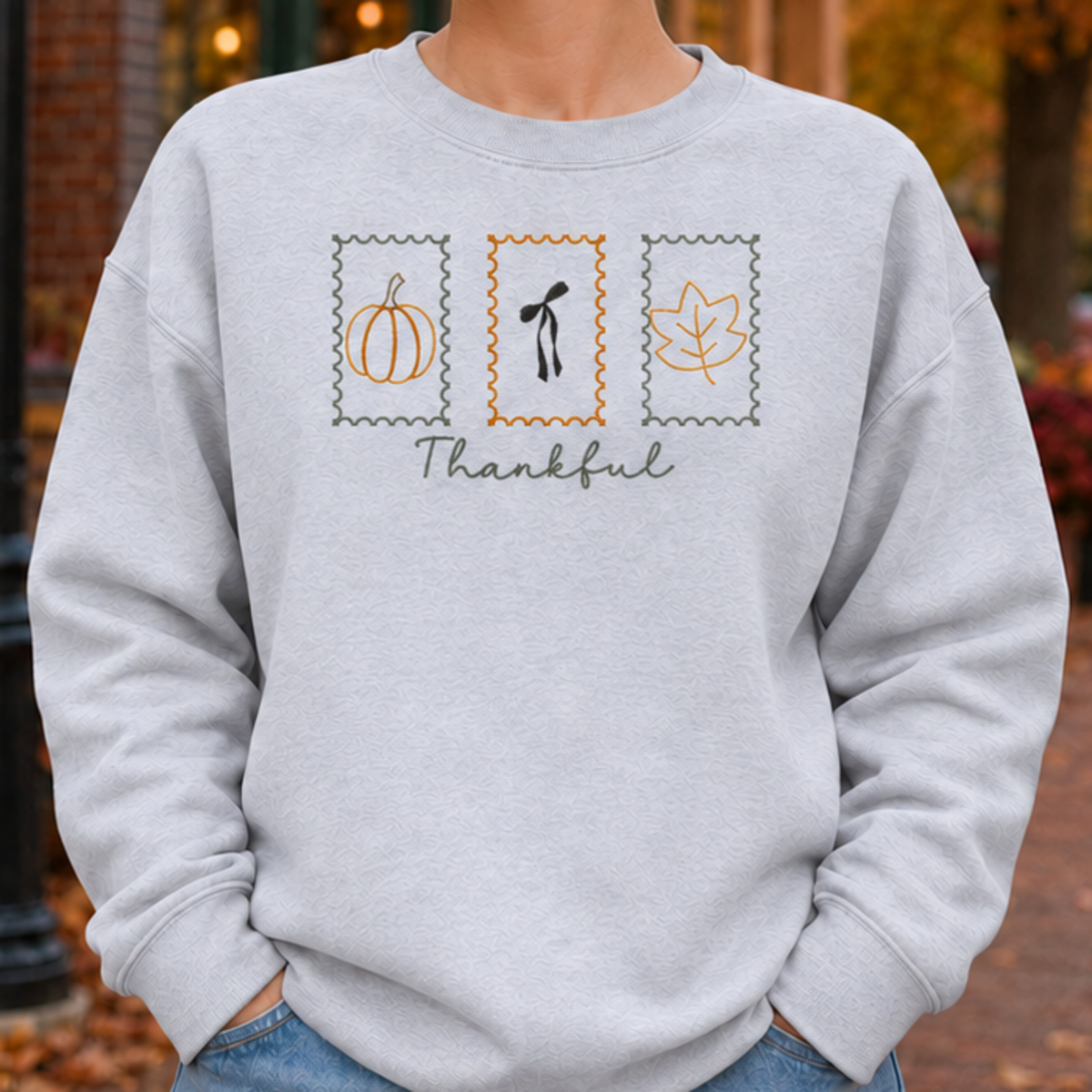 Ash Thankful Stamps embroidered sweatshirt fit and chest placement