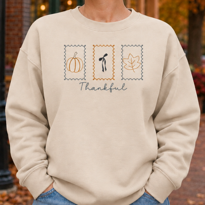 Sand Thankful Stamps embroidered sweatshirt fit and chest placement