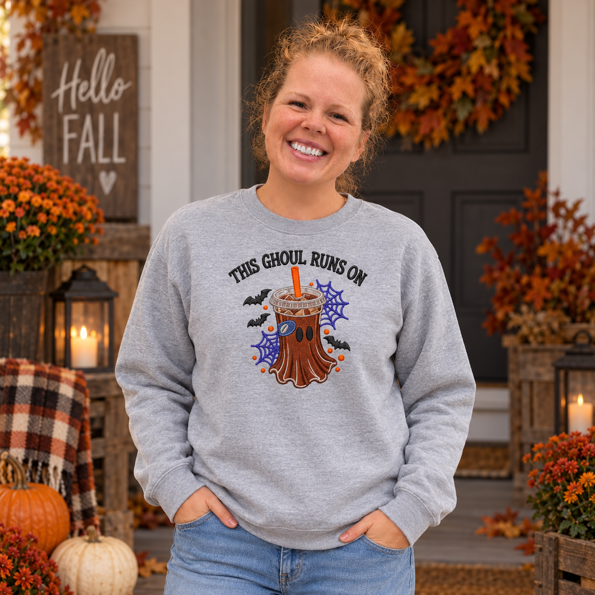 Woman wearing Sport Grey This Ghoul Runs on Iced Coffee embroidered sweatshirt