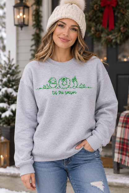 Woman wearing Sport Grey Tis The Season green embroidered Christmas crewneck sweatshirt