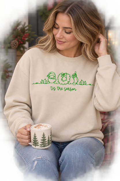 Woman wearing Sand Tis The Season green embroidered Christmas crewneck