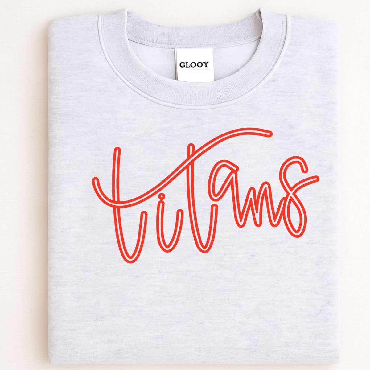 Folded ash gray crewneck with red Titans script embroidery