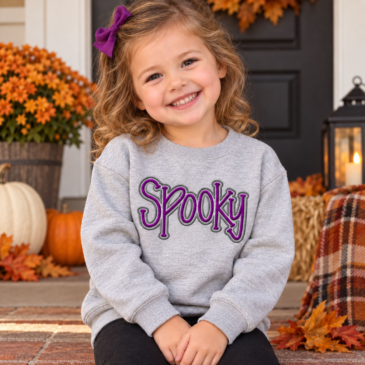 Toddler girl wearing a heather gray Spooky puff embroidered Halloween crewneck
