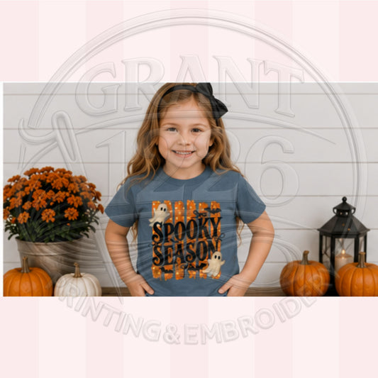Toddler wearing vintage denim Halloween ghost shirt for spooky season