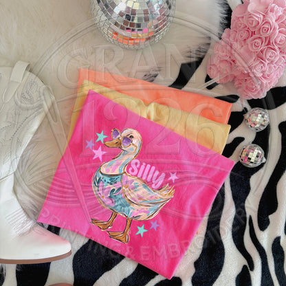 Silly Goose Comfort Colors graphic tee in neon pink with colorful funny goose DTG print