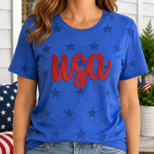 Woman wearing Royal Star USA glitter appliqué patriotic T-shirt