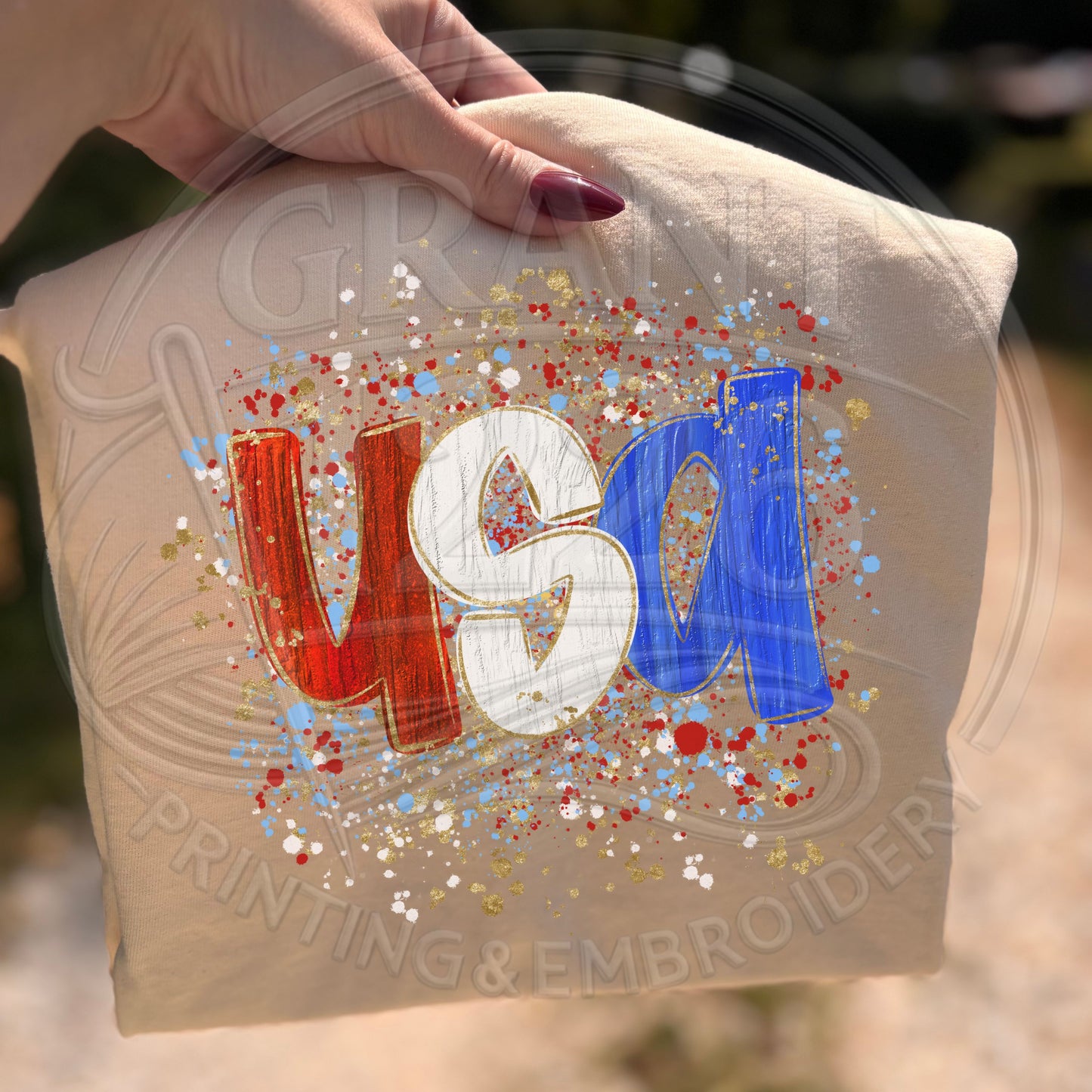 Ivory patriotic USA splatter paint graphic tee for summer and Fourth of July