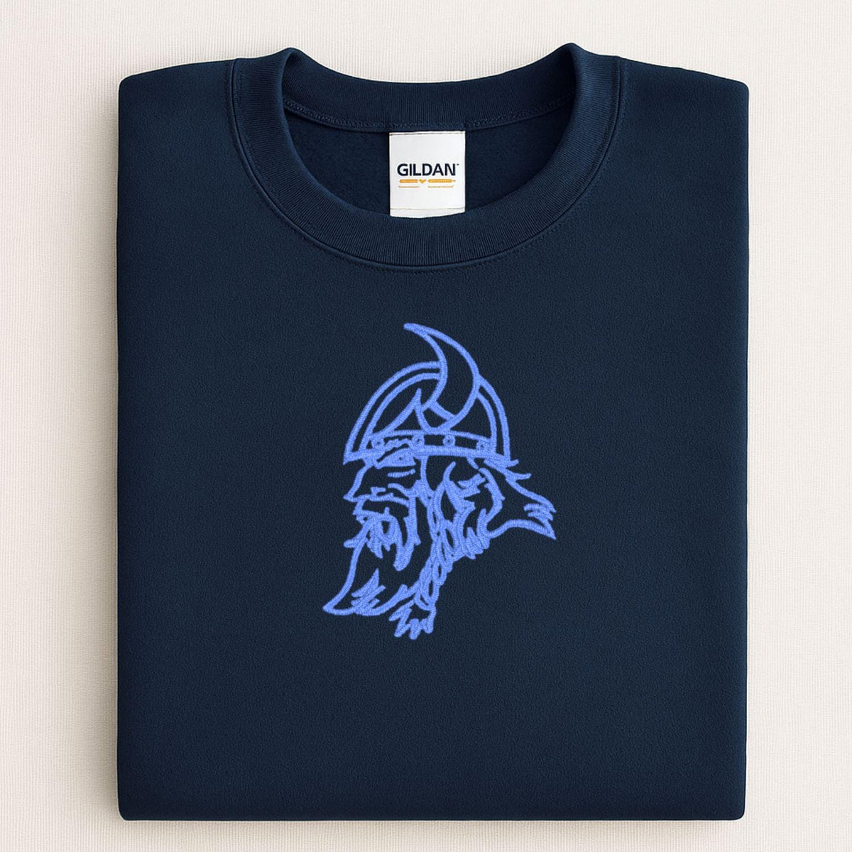 Navy sweatshirt with blue vintage Viking mascot embroidery folded flat