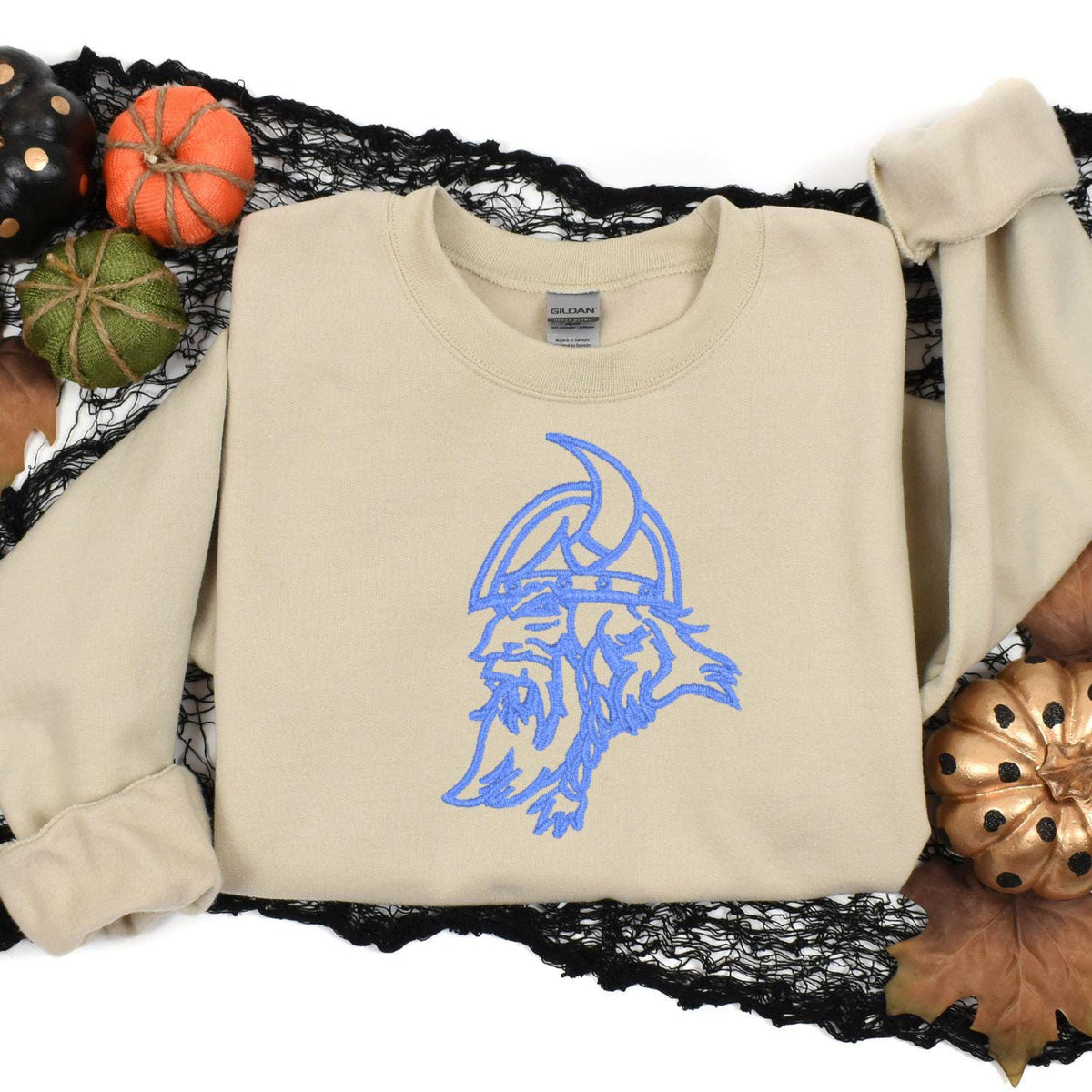 Sand Viking mascot sweatshirt styled with fall pumpkins and black lace