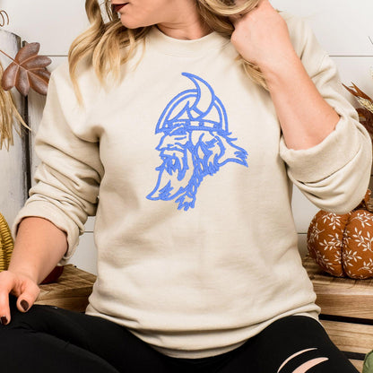 Sand vintage Viking mascot embroidered sweatshirt modeled indoors