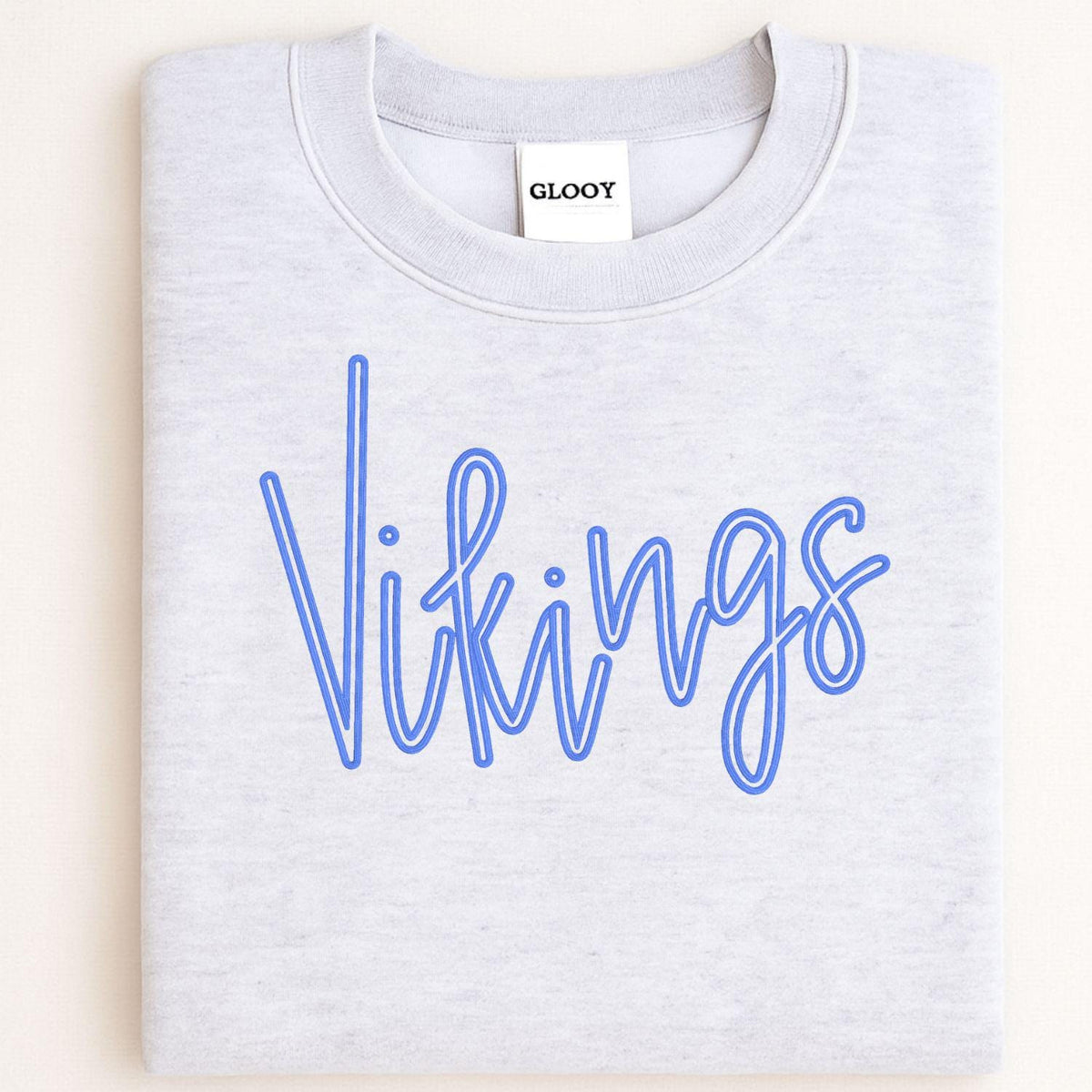 Folded ash gray crewneck with blue Vikings script embroidery