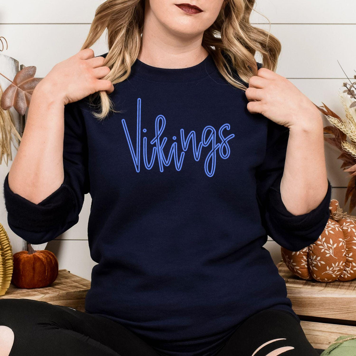 Front view of navy Vikings script embroidered game day crewneck