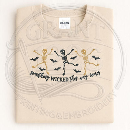 Sand Something Wicked This Way Comes embroidered Halloween sweatshirt with dancing skeleton design