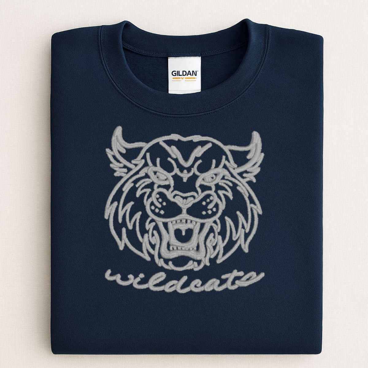 Navy vintage Wildcats mascot embroidered sweatshirt folded flat
